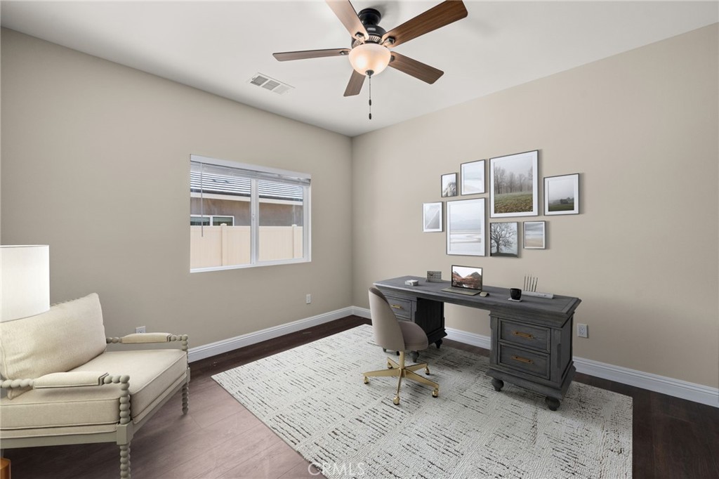 1243 Ansley Lane Mentone, CA 92359 - Photo 11 of 24 a workspace with a couch and a window