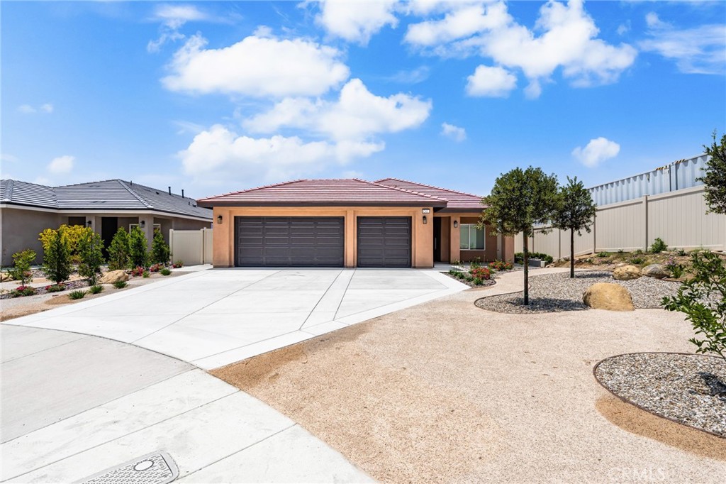 1243 Ansley Lane Mentone, CA 92359 - Photo 2 of 24 a house with yard in front of it