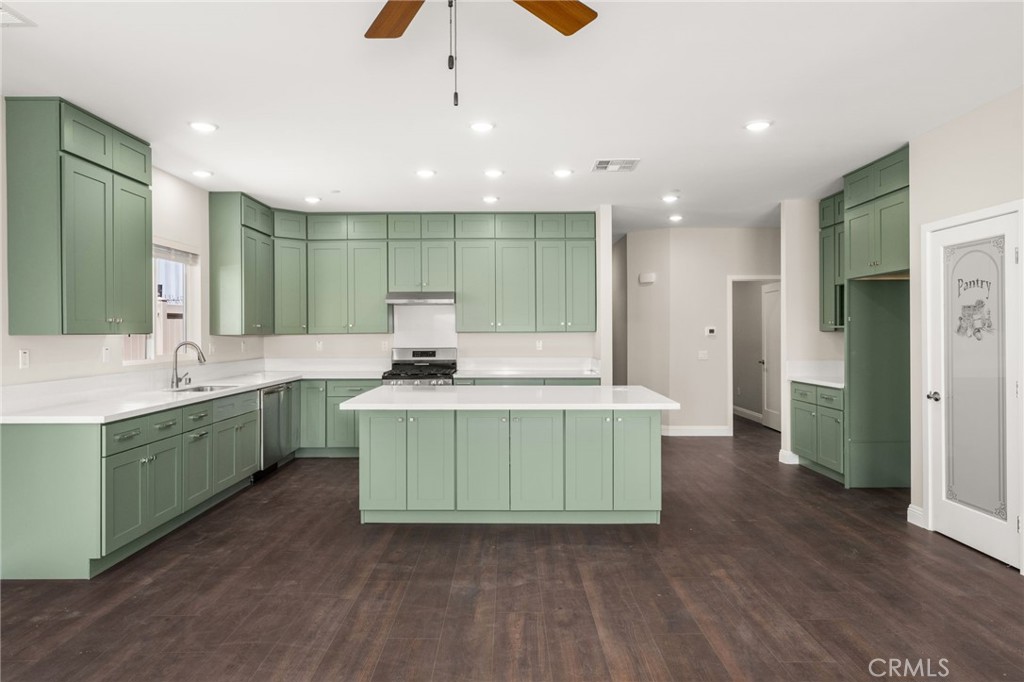1243 Ansley Lane Mentone, CA 92359 - Photo 6 of 24 a bathroom with a sink double vanity and a mirror