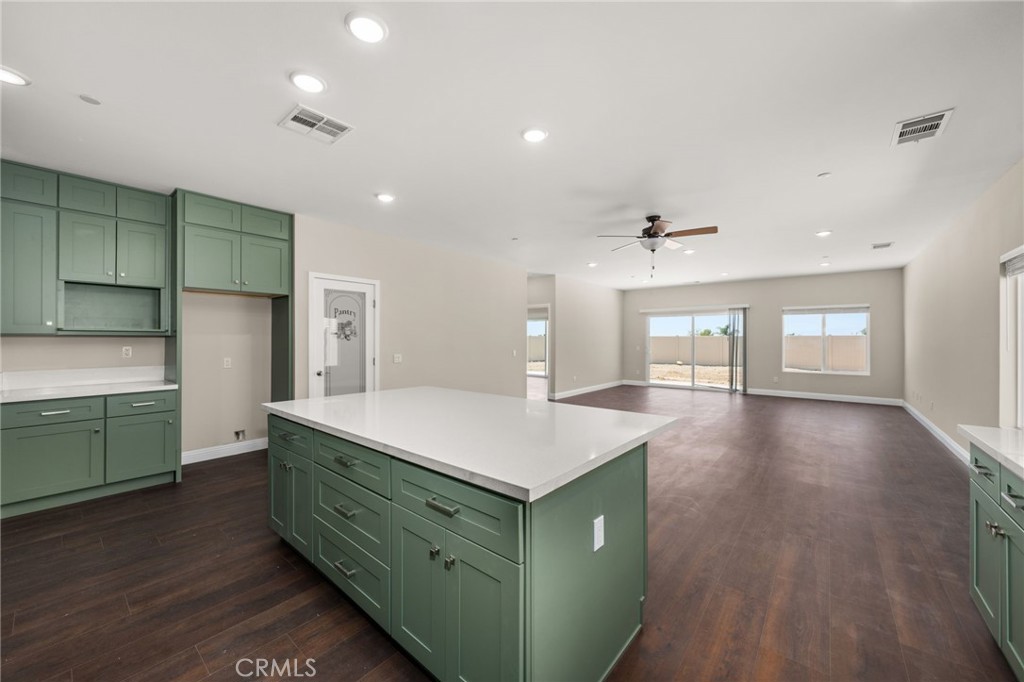 1243 Ansley Lane Mentone, CA 92359 - Photo 7 of 24 a kitchen with sink and cabinets
