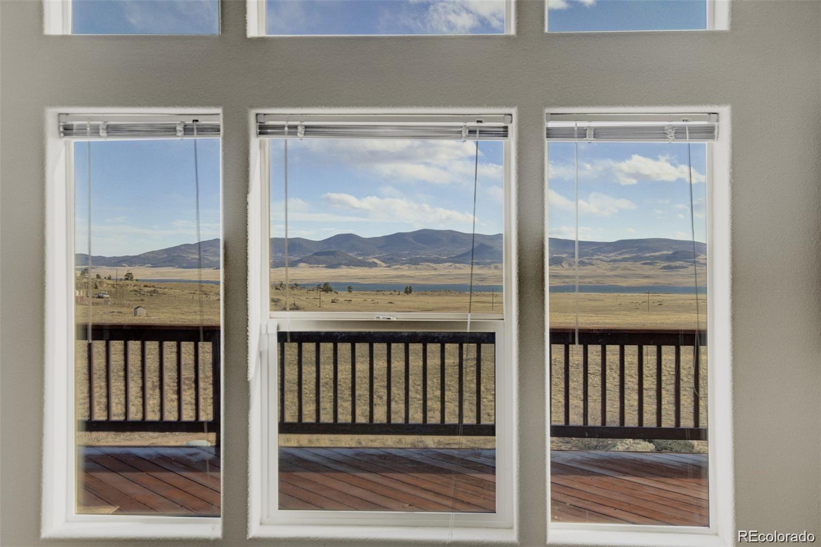 688 Tiara Road Lake George, CO 80827 - Photo 2 of 46 a view of a balcony from a window