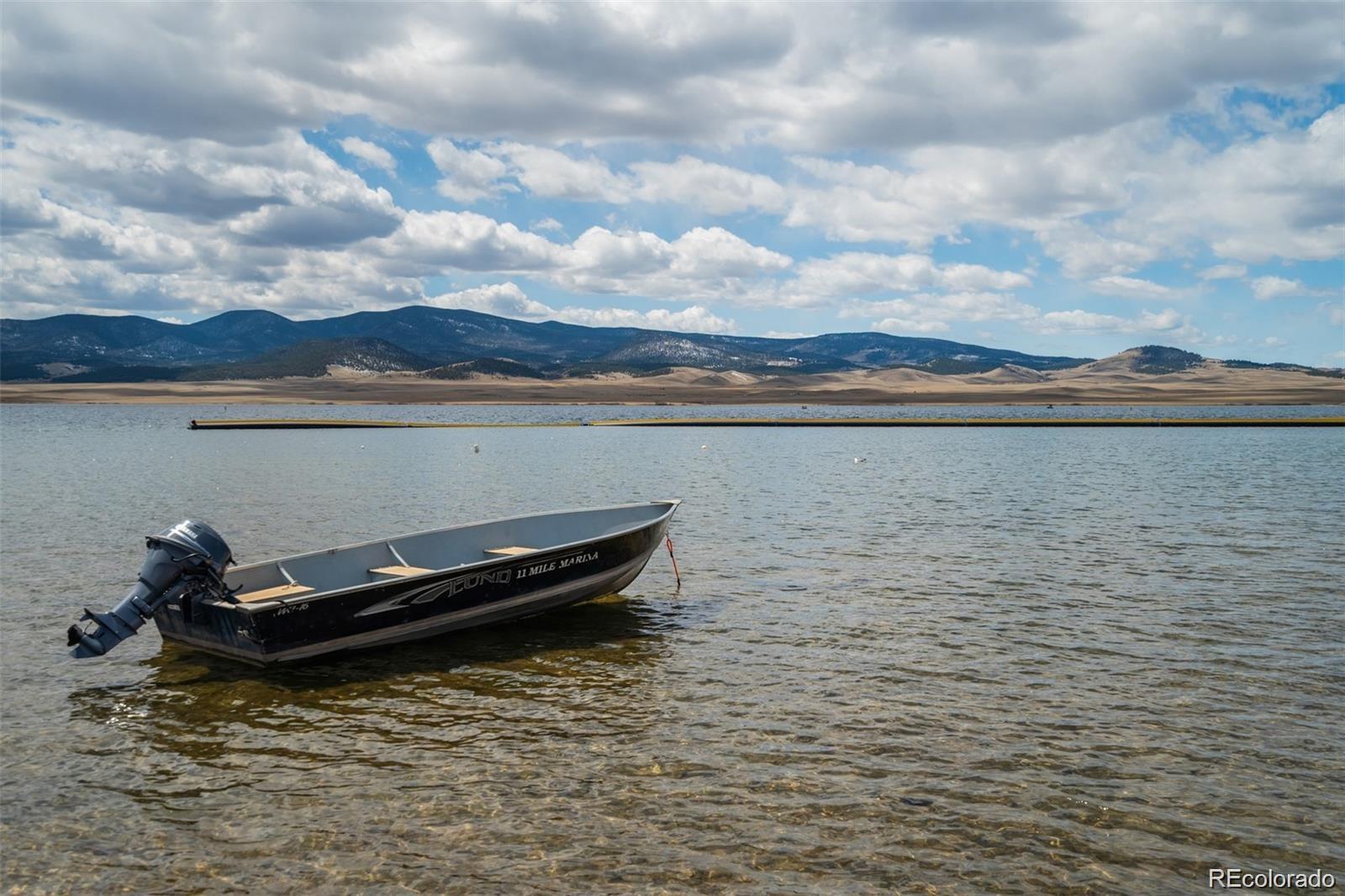 688 Tiara Road Lake George, CO 80827 - Photo 3 of 46 a view of a lake with mountain in the background