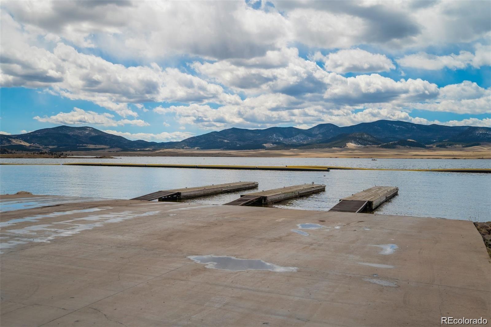 688 Tiara Road Lake George, CO 80827 - Photo 33 of 46 a view of a lake with a mountain in the background