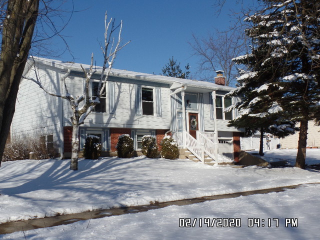 346 Rockhurst Road Bolingbrook, IL 60440 - Photo 1 of 19 a view of a white building with a fountain