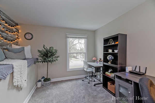 346 Rockhurst Road Bolingbrook, IL 60440 - Photo 14 of 19 a view of a workspace with furniture and a window