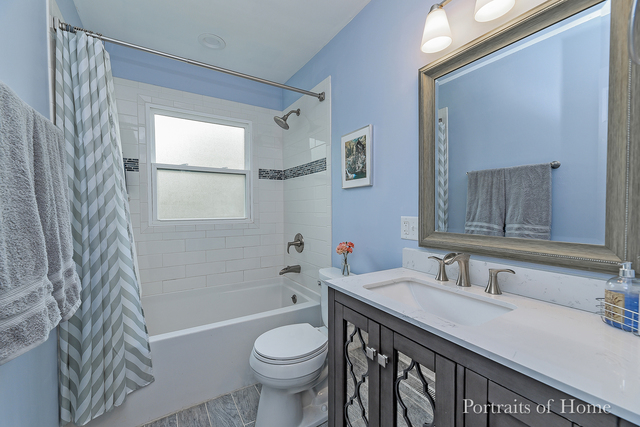 346 Rockhurst Road Bolingbrook, IL 60440 - Photo 15 of 19 a bathroom with a sink a toilet and shower