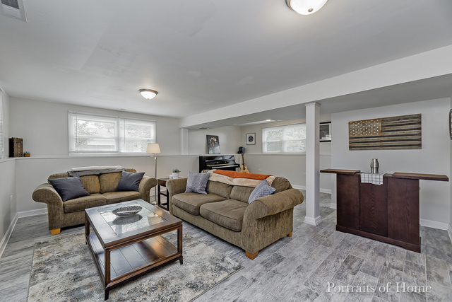 346 Rockhurst Road Bolingbrook, IL 60440 - Photo 16 of 19 a living room with furniture and a window
