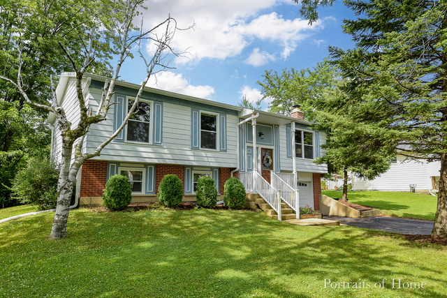 346 Rockhurst Road Bolingbrook, IL 60440 - Photo 3 of 19 a front view of house with yard and green space