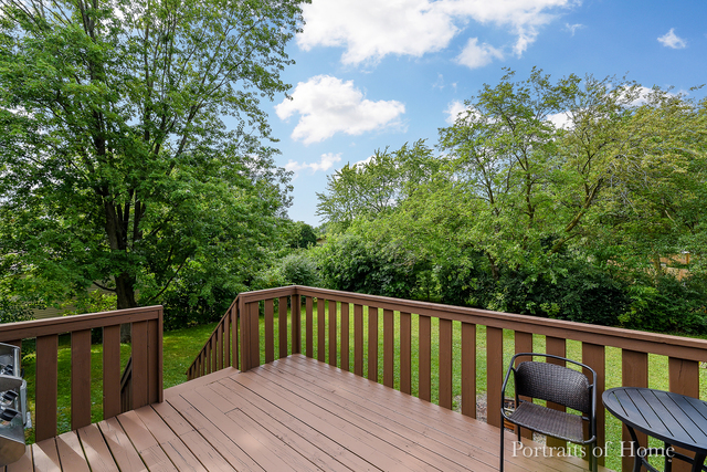346 Rockhurst Road Bolingbrook, IL 60440 - Photo 5 of 19 a balcony with wooden floor and outdoor space