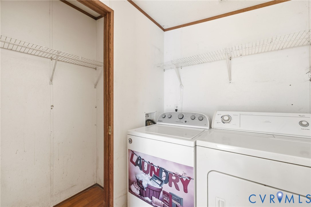 7410 Richmond Road Amelia Court House, VA 23002 - Photo 12 of 39 a utility room with dryer and washer