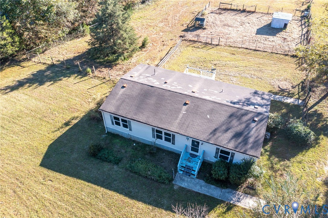 7410 Richmond Road Amelia Court House, VA 23002 - Photo 23 of 39 a view of a house with a yard from a balcony