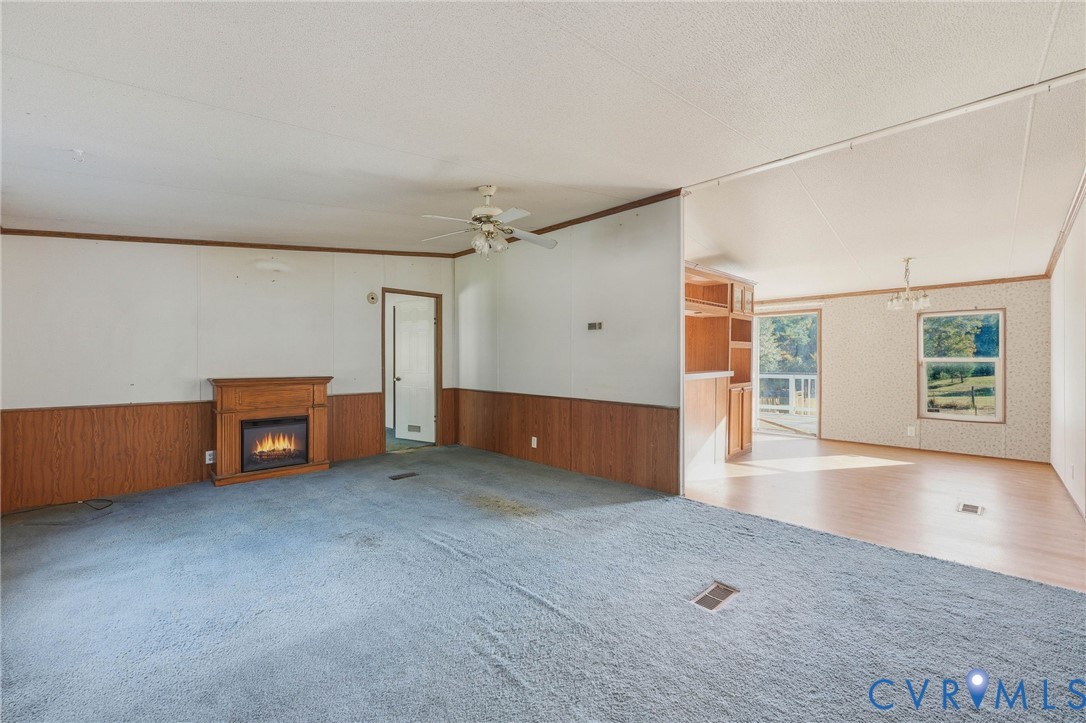 7410 Richmond Road Amelia Court House, VA 23002 - Photo 5 of 39 an empty room with windows