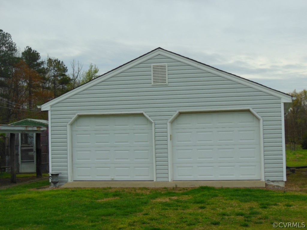 12601 Beach Road Chesterfield, VA 23838 - Photo 2 of 17 a front view of brick house with a yard