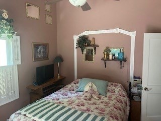 58 Maebeth Street Springfield, MA 01119 - Photo 12 of 22 a bedroom with a bed and a television