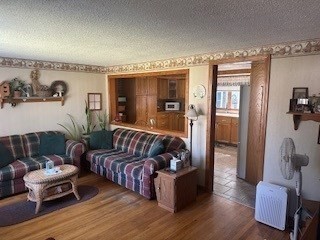 58 Maebeth Street Springfield, MA 01119 - Photo 21 of 22 a living room with furniture and a wooden floor