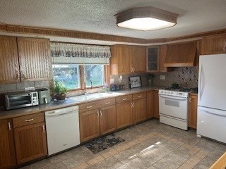 58 Maebeth Street Springfield, MA 01119 - Photo 22 of 22 a kitchen with sink cabinets and window