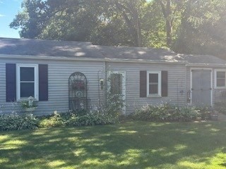 58 Maebeth Street Springfield, MA 01119 - Photo 6 of 22 a front view of a house with garden