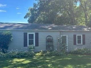 58 Maebeth Street Springfield, MA 01119 - Photo 7 of 22 a front view of a house with garden
