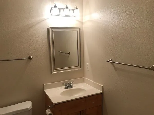 a backyard of a house with outdoor seating