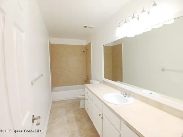 a bathroom with a sink and a bathtub