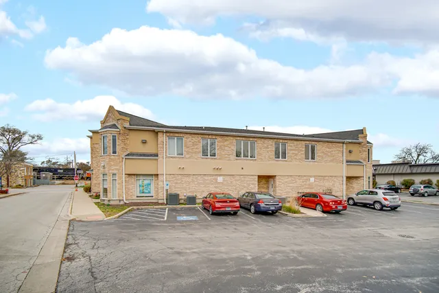 a view of a street with cars
