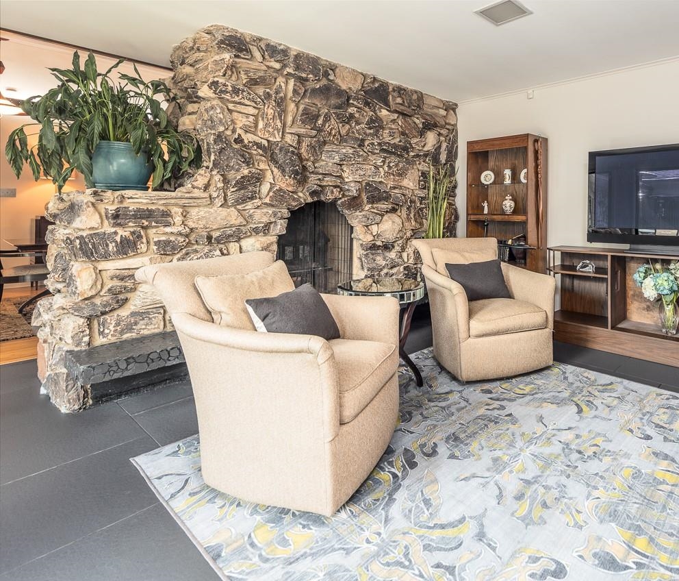 110 Wallace Road Memphis, TN 38117 - Photo 23 of 25 a living room with furniture and a fireplace