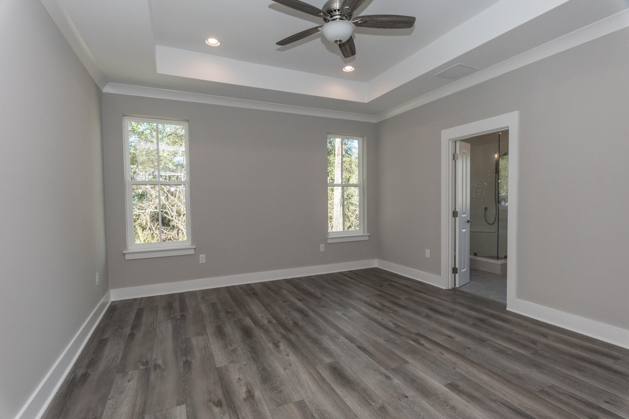190 Bear Creek Boulevard Freeport, FL 32439 - Photo 29 of 85 wooden floor in an empty room with a window