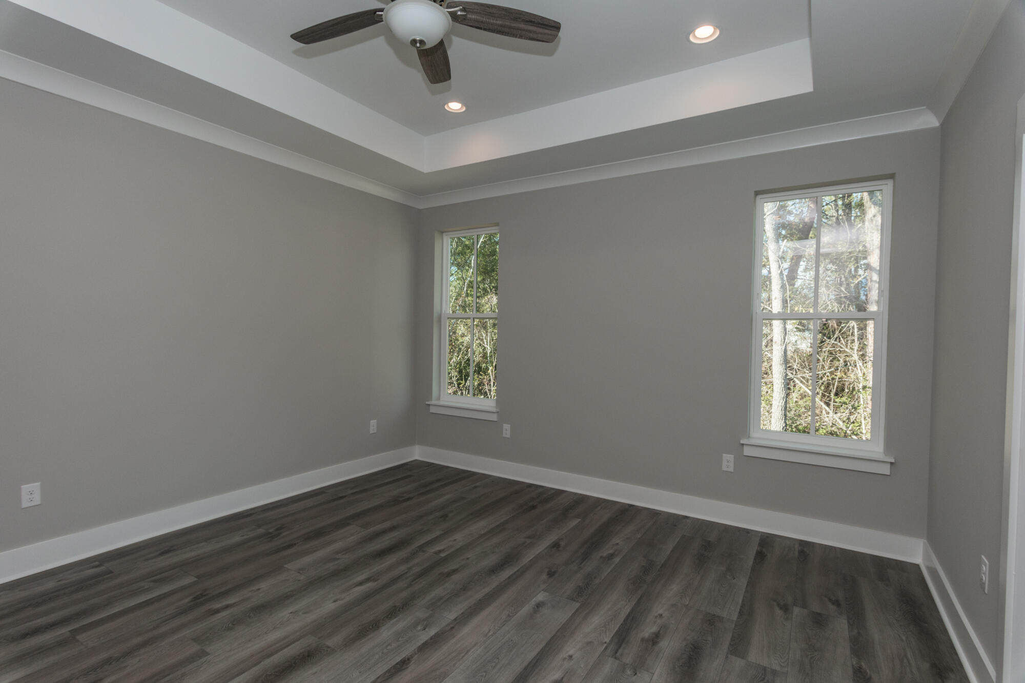 190 Bear Creek Boulevard Freeport, FL 32439 - Photo 30 of 85 an empty room with wooden floor and windows