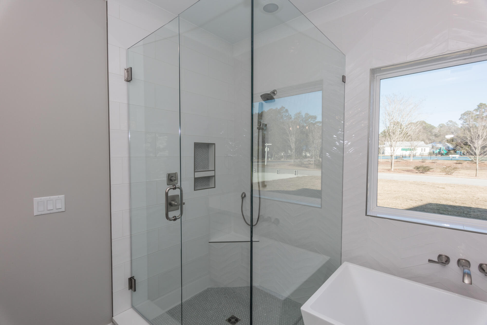 190 Bear Creek Boulevard Freeport, FL 32439 - Photo 33 of 85 a bathroom with a bathtub and a shower