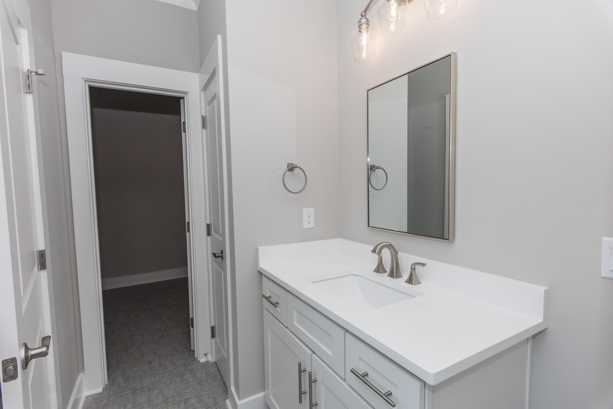 190 Bear Creek Boulevard Freeport, FL 32439 - Photo 37 of 85 a bathroom with a sink and a mirror