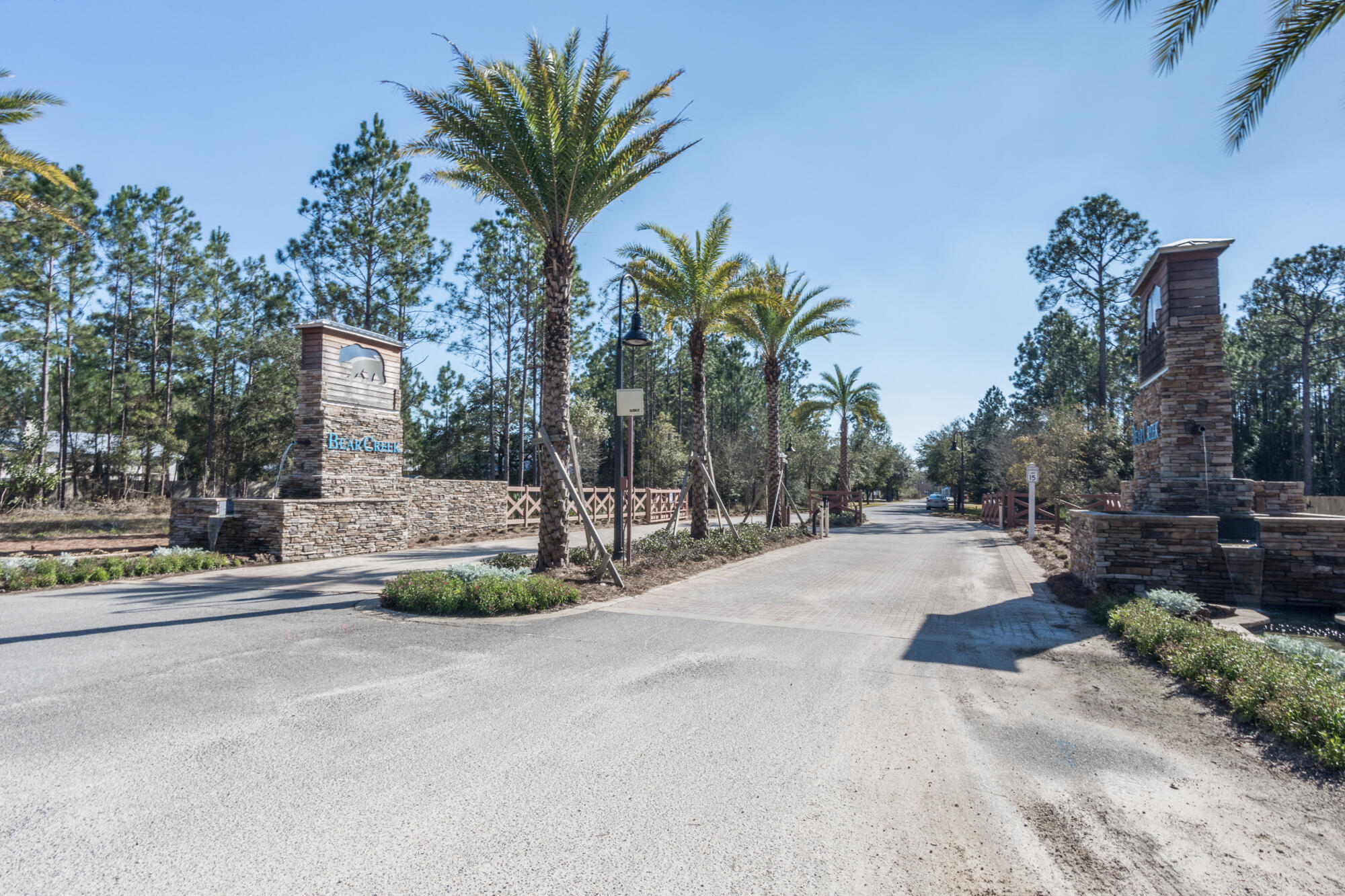 190 Bear Creek Boulevard Freeport, FL 32439 - Photo 58 of 85 a front view of a house with outdoor space and trees around