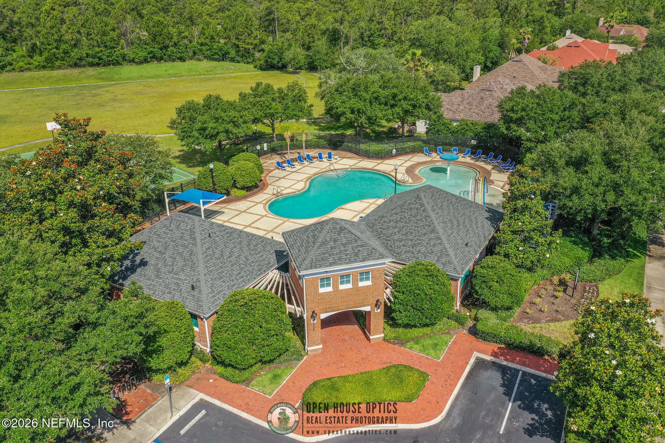 841 Ifield Road St. Augustine, FL 32095 - Photo 59 of 69 an aerial view of a house with a swimming pool patio and outdoor seating
