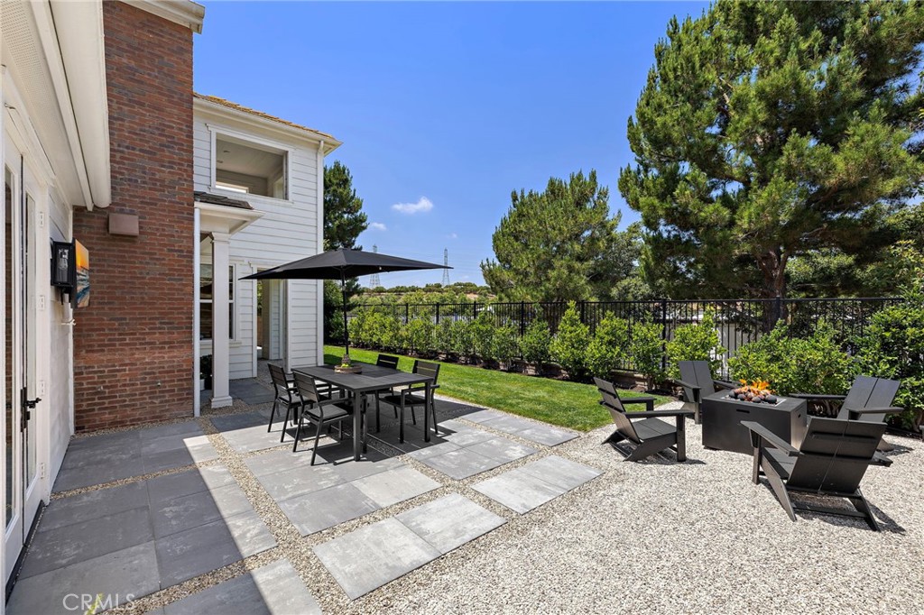 3 Tranquility Place Ladera Ranch, CA 92694 - Photo 5 of 63 a backyard of a house with table and chairs
