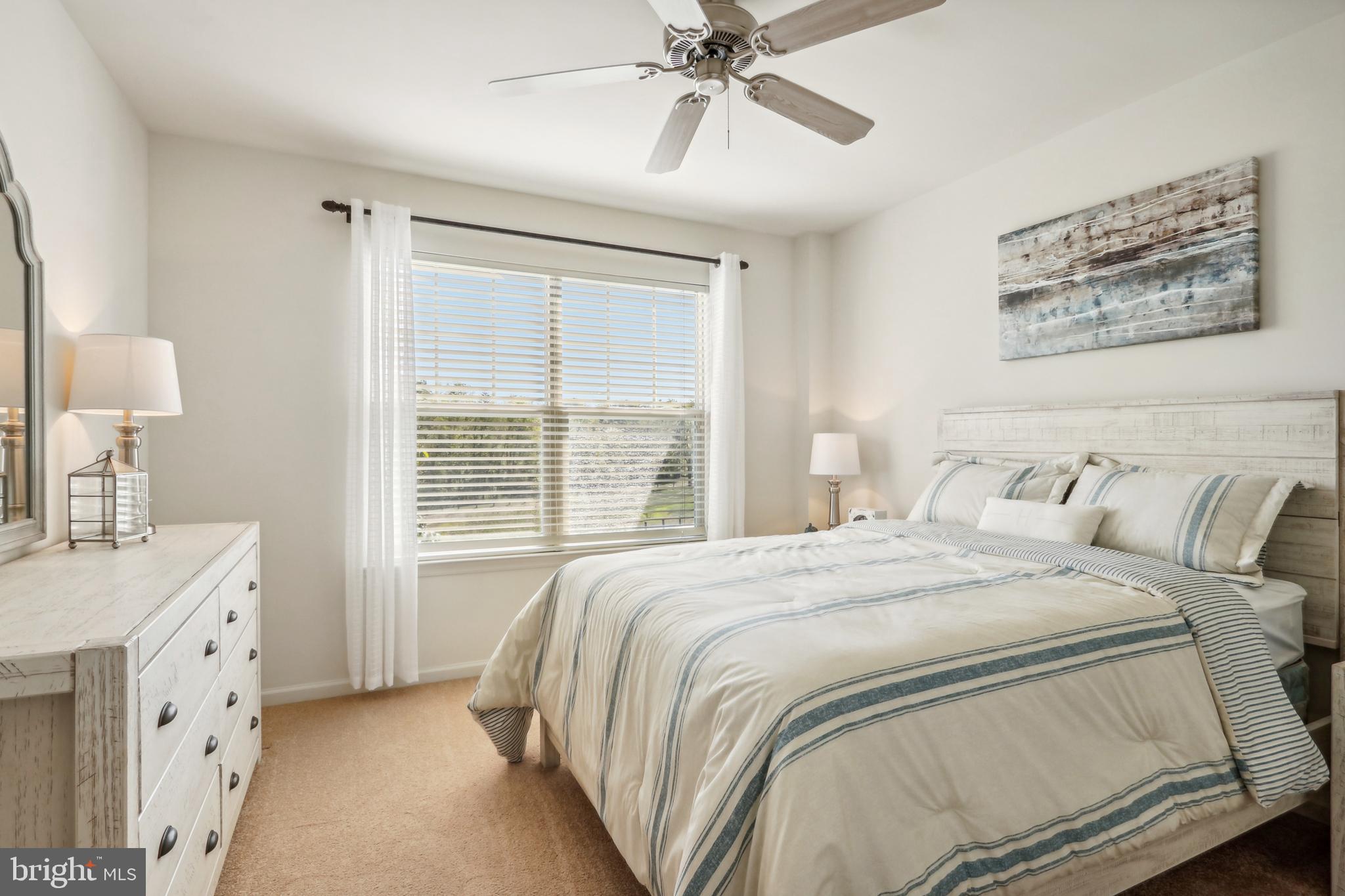 509 Ridgeview Court Sellersville, PA 18960 - Photo 13 of 20 a bedroom with a bed and a chandelier