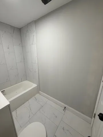 a bathroom with a bathtub