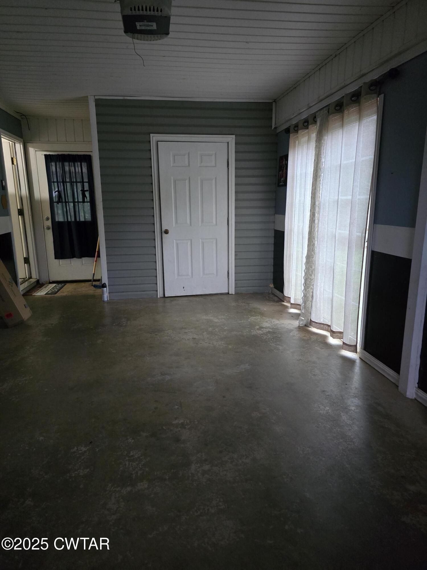 143 Elizabeth Cove Selmer, TN 38375 - Photo 6 of 14 an empty room with windows