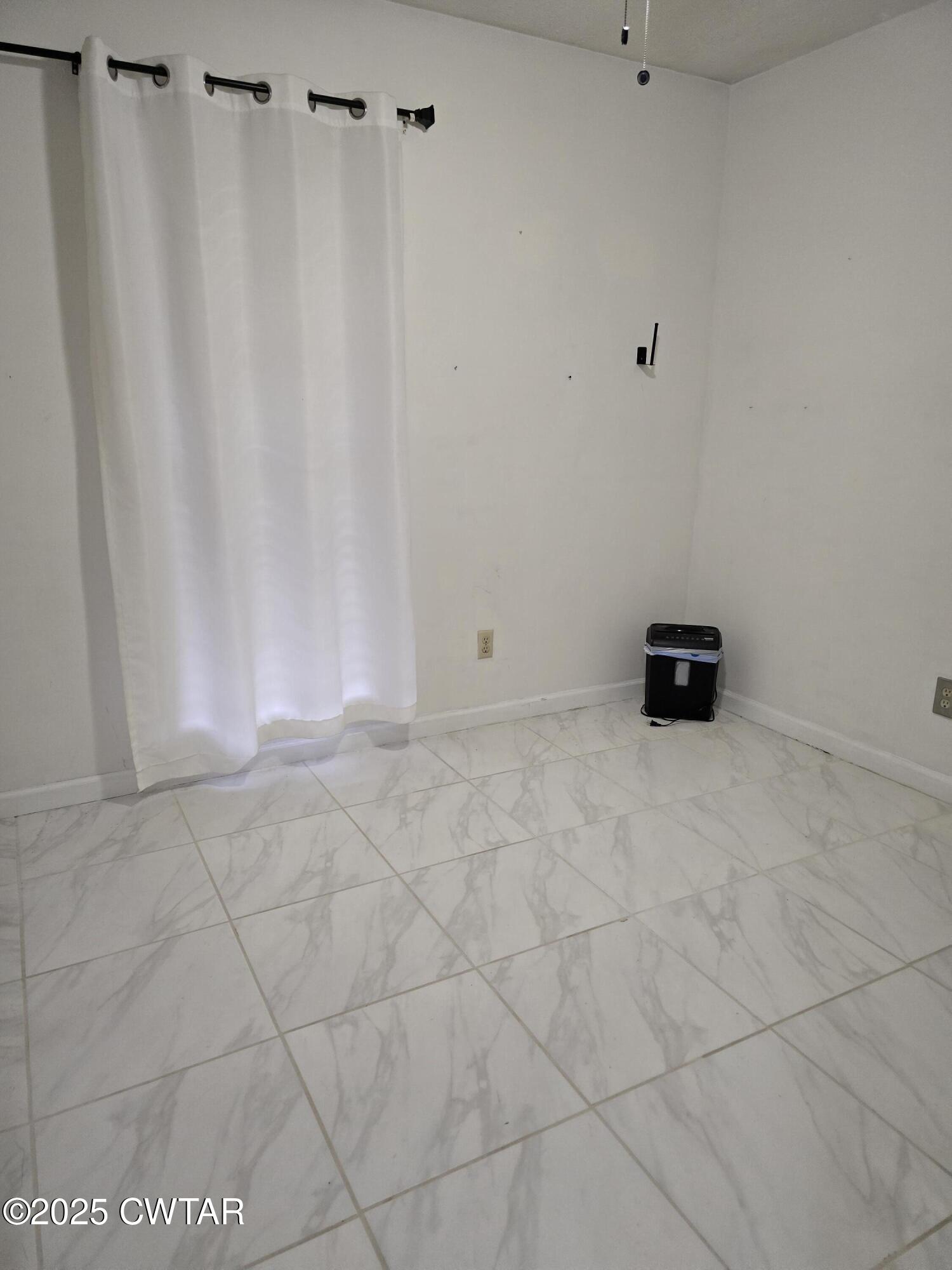 143 Elizabeth Cove Selmer, TN 38375 - Photo 9 of 14 a view of an empty room