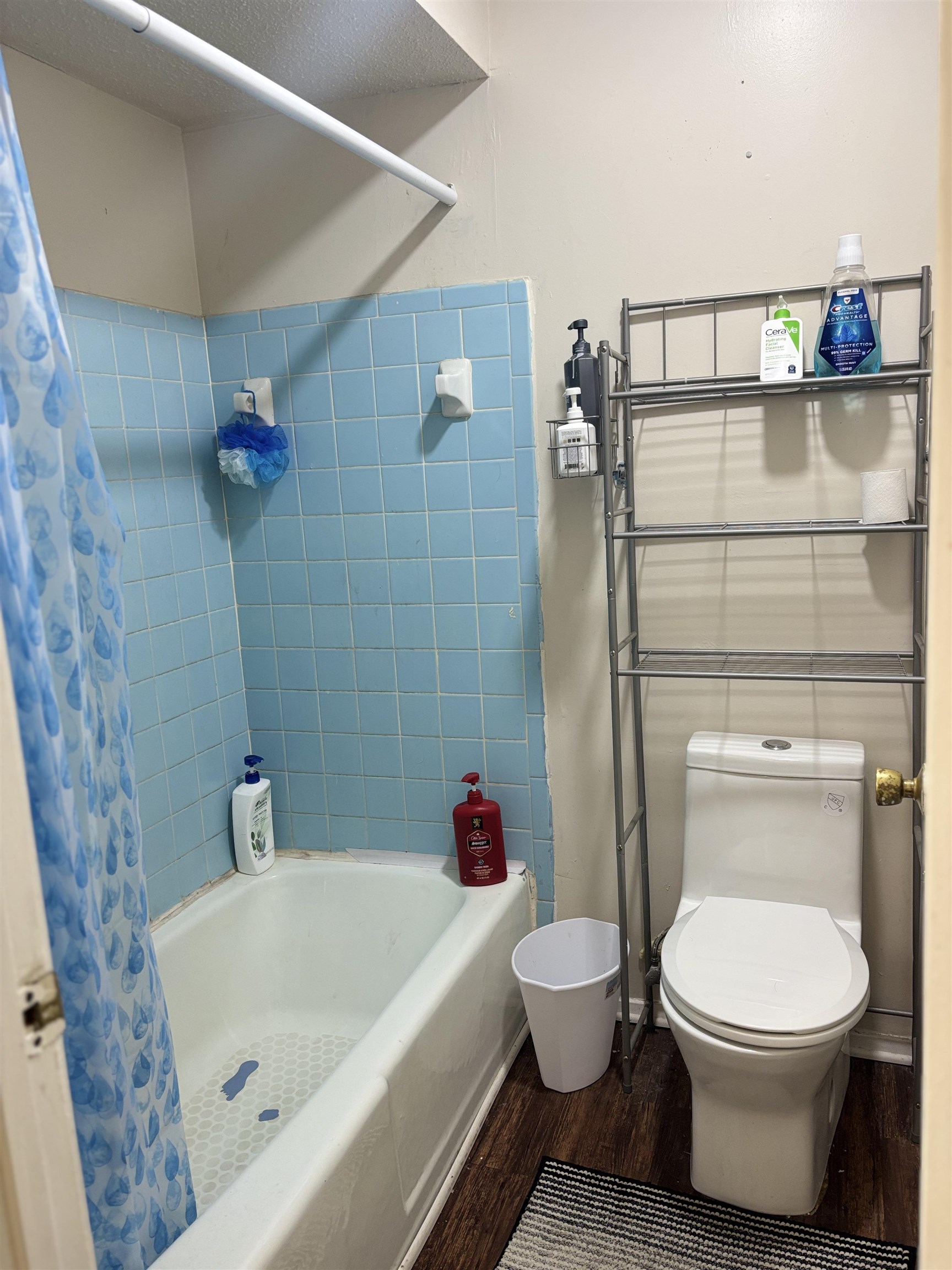 3626 Outland Road, Unit 86 Memphis, TN 38118 - Photo 14 of 24 Full bath featuring wood finished floors, toilet, and shower / tub combo