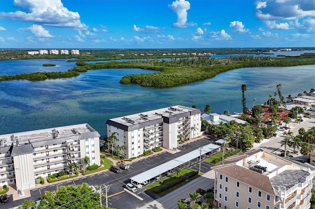9011 Midnight Pass Road, Unit 426 Sarasota, FL 34242 - Photo 4 of 53 view of a city with an ocean