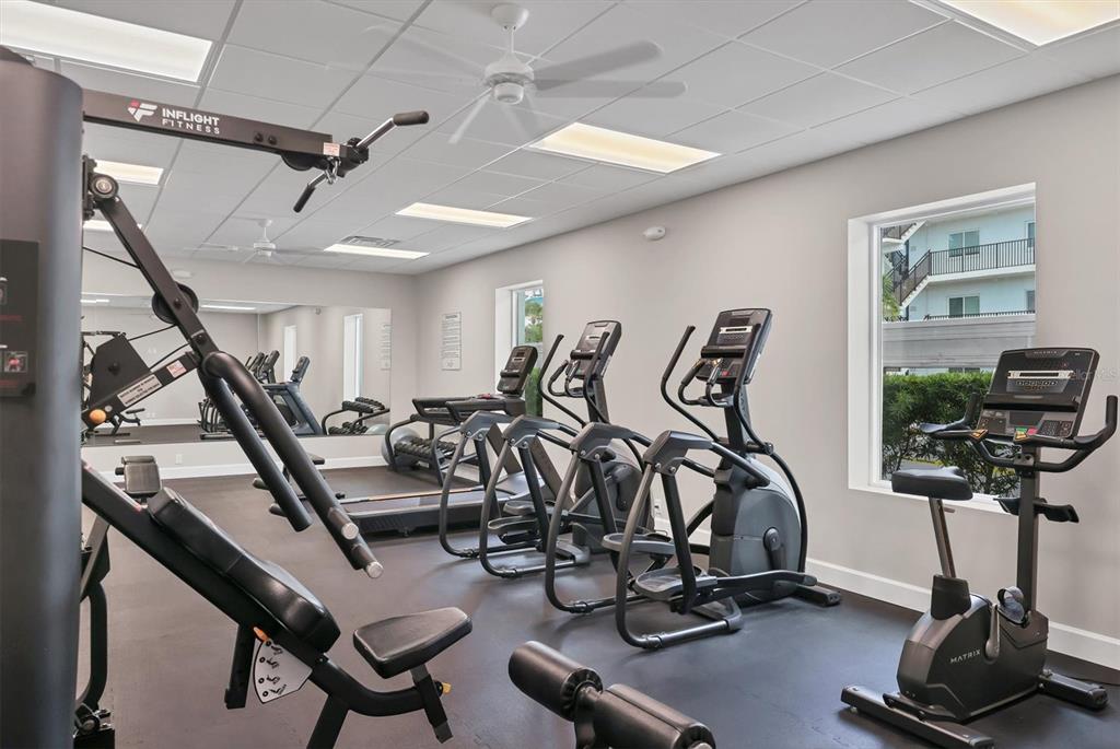 9011 Midnight Pass Road, Unit 426 Sarasota, FL 34242 - Photo 43 of 53 a view of a room with gym equipment