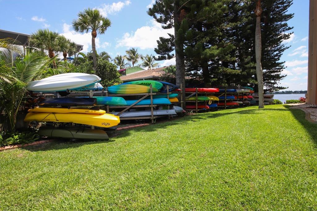 9011 Midnight Pass Road, Unit 426 Sarasota, FL 34242 - Photo 52 of 53 a childrens park with lots of swings and slides