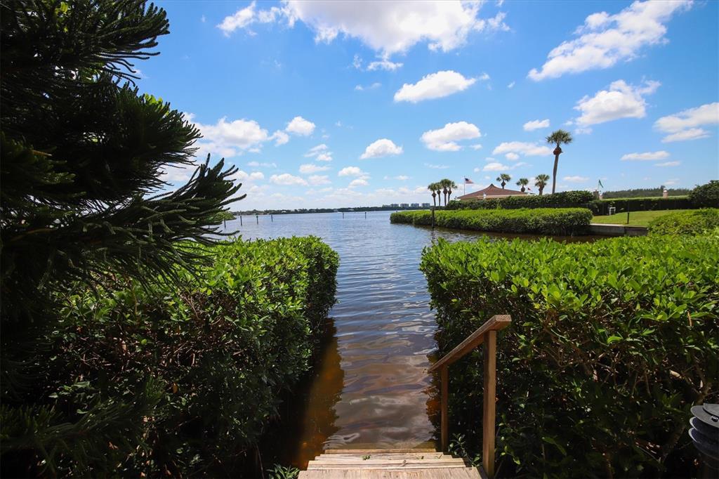 9011 Midnight Pass Road, Unit 426 Sarasota, FL 34242 - Photo 53 of 53 a view of a lake with a outdoor space