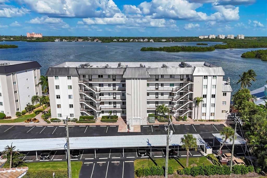 9011 Midnight Pass Road, Unit 426 Sarasota, FL 34242 - Photo 6 of 53 aerial view of a building