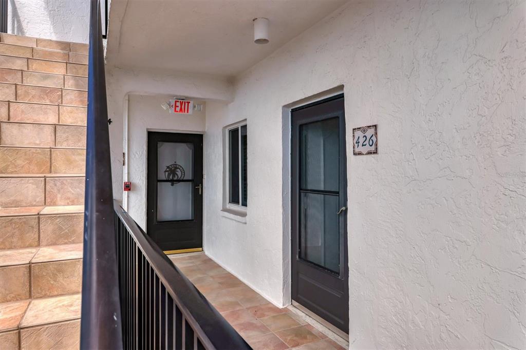 9011 Midnight Pass Road, Unit 426 Sarasota, FL 34242 - Photo 8 of 53 a view of a hallway