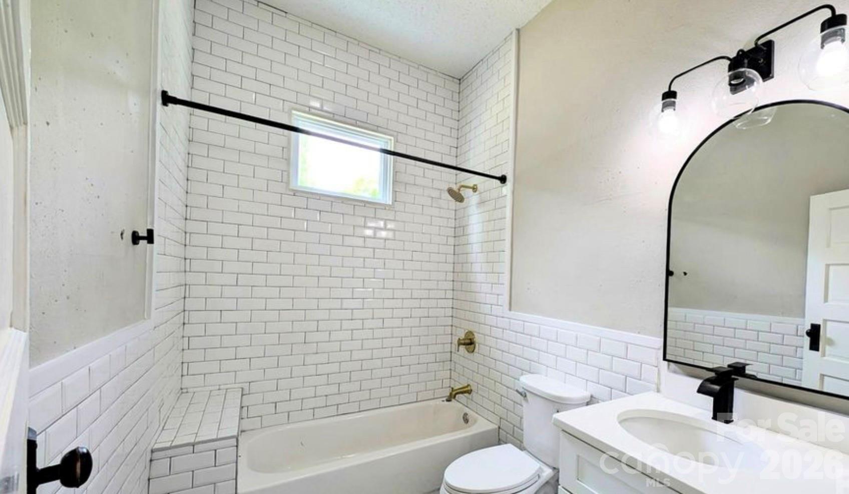 113 Brawley Street Chester, SC 29706 - Photo 8 of 12 a bathroom with a sink and a mirror