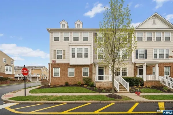 a view of a building with a yard