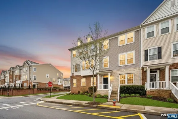 a view of a building with a yard