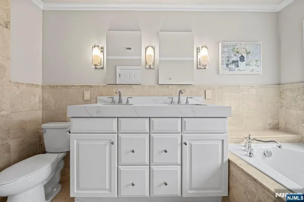 a bathroom with a sink and a toilet