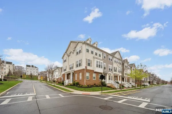 a view of a building with a street