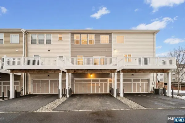 a front view of building with multiple windows